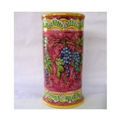 Umbrella stand with blue grapes.